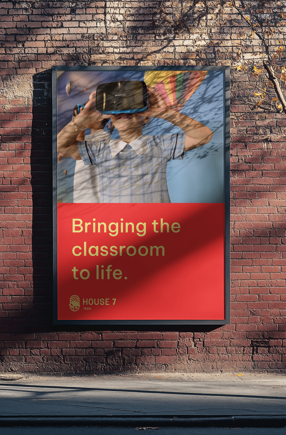 House 7 Tech 'Bringing the classroom to life' red poster mounted on a brick wall